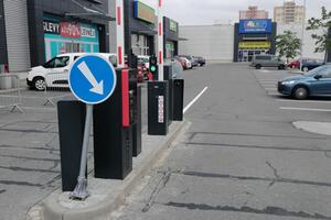 Automatic barriers for entering the parking lot of the Park&shop shopping area